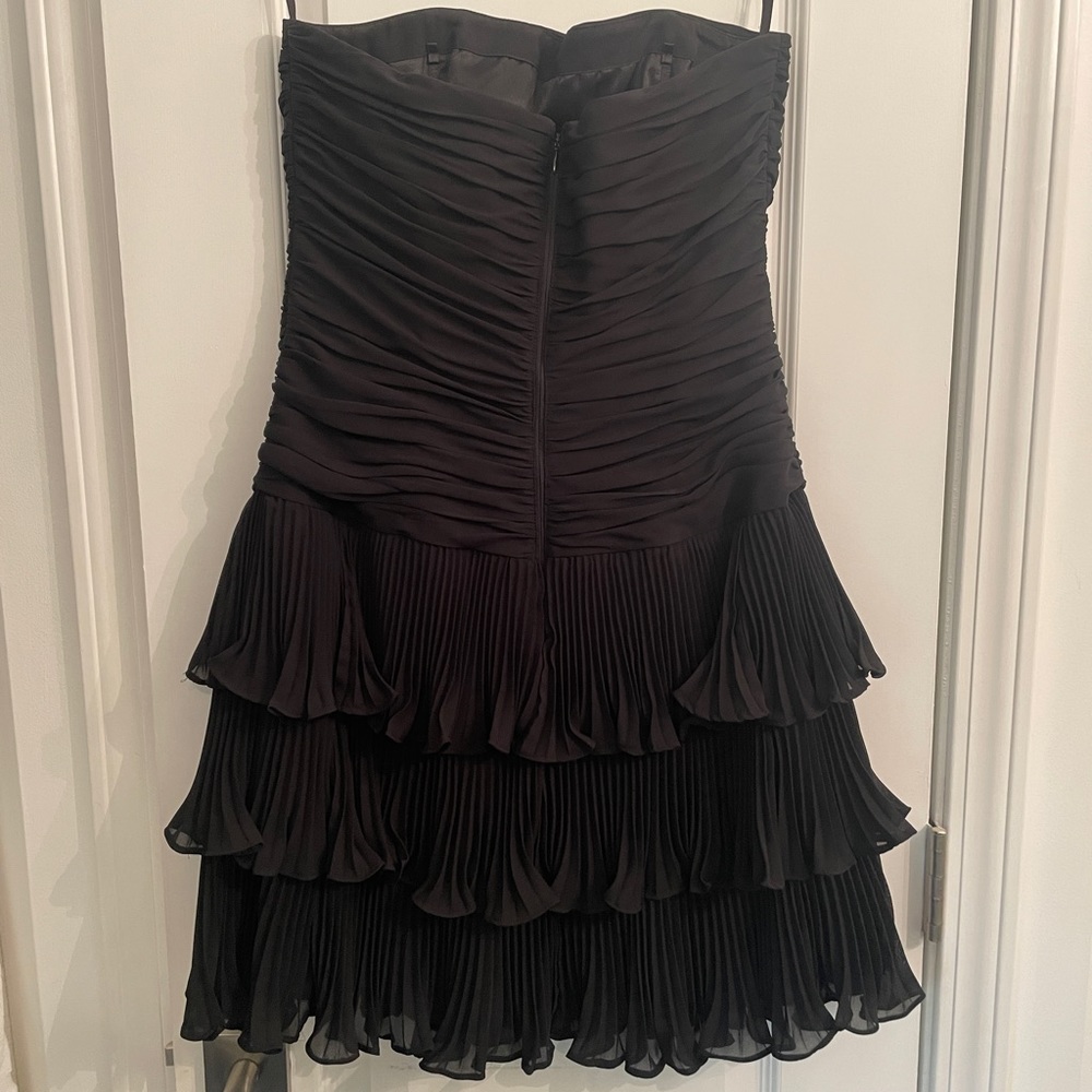 Gently used White House Black Market strapless dress in Black